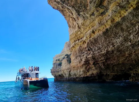 Catamaran departing Albufeira Marina for the Benagil Cave tour
