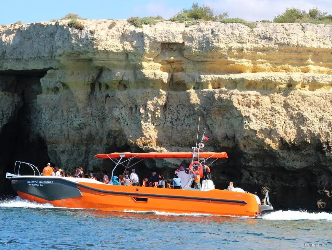 Skipper guiding the boat toward Benagil Cave on the Vilamoura tour