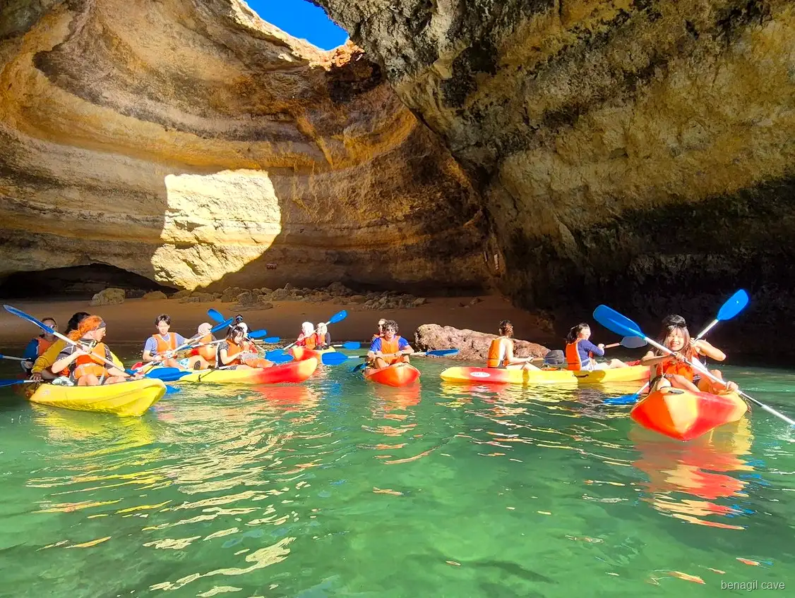Kayakers paddling toward Algar de Benagil on the Benagil Cave kayak tour